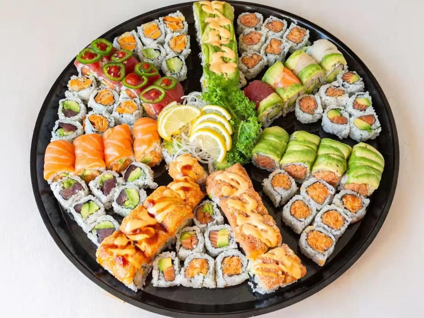 Assorted sushi rolls with diverse fillings and toppings at Hana Sushi & Asian Cuisine, a Asian Restaurant in Maplewood